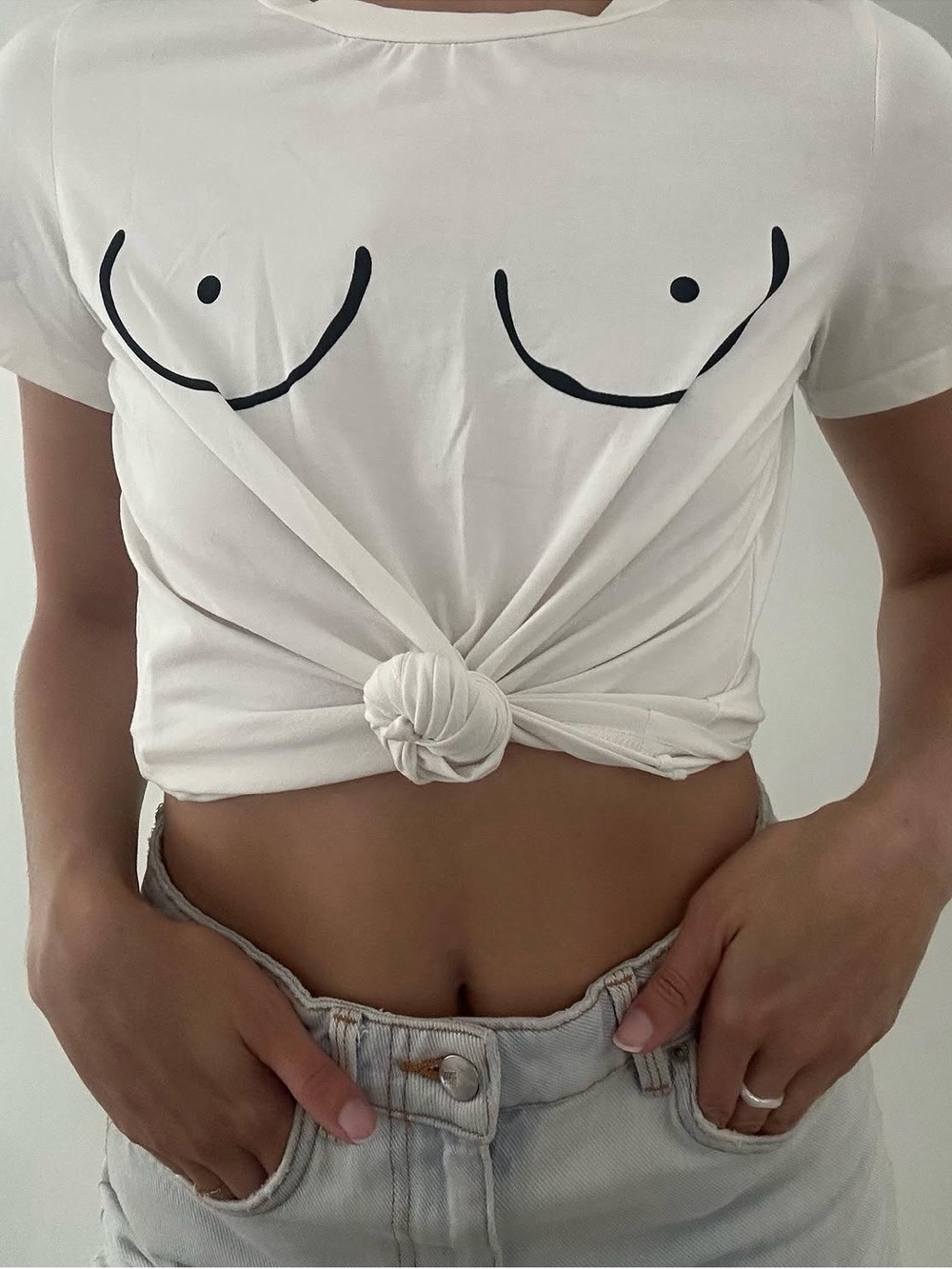 White Graphic Tee with Minimal Black Line Art - Picture 2 of 2